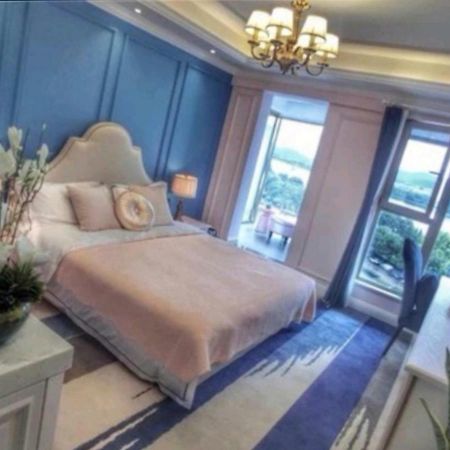 Huanlesong Youth Hostel Ухань Экстерьер фото