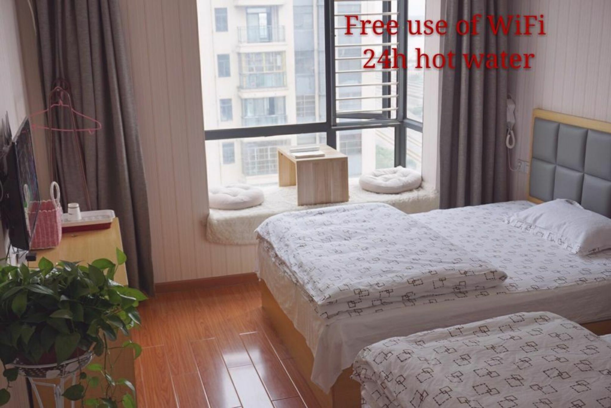Huanlesong Youth Hostel Ухань Экстерьер фото